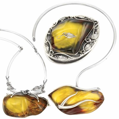 Lot 904 - Two Sterling Silver and Amber Pendant Necklaces and Box