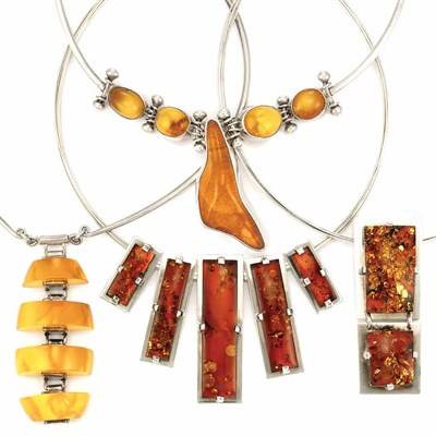 Lot 903 - Four Amber and Sterling Silver Necklaces