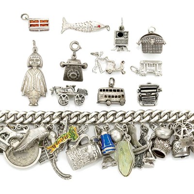 Lot 908 - Group of Sterling Silver and Metal Charms and Charm Bracelets