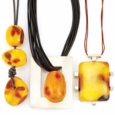Lot 910 - Three Large Sterling Silver and Amber Necklaces