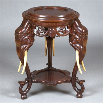 Lot 120 - Carved Mahogany Stand With elephant-form...