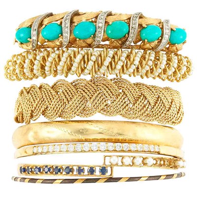 Lot 102 - Group of Seven Gold and Metal Bangle Bracelets