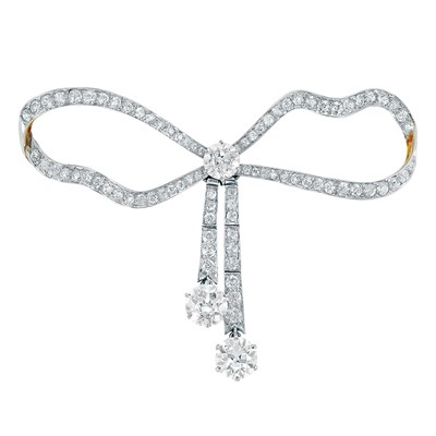 Lot 621 - Belle Epoque Platinum, Gold and Diamond Bow Brooch