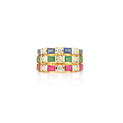 Lot 496 - Three Gold, Ruby, Sapphire, Emerald and Diamond Band Rings