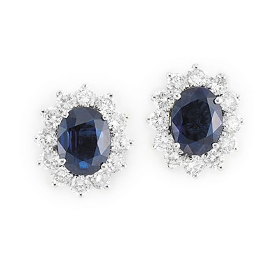 Lot 609 - Pair of White Gold, Sapphire and Diamond Earrings