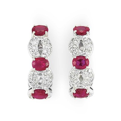 Lot 304 - Pair of White Gold, Ruby and Diamond Hoop Earrings