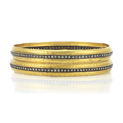 Lot 372 - Pair of Indian Gold, Silver and Diamond Bangle Bracelets