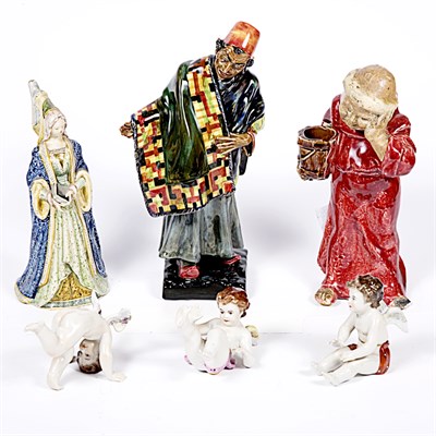 Lot 304 - Group of Nine Porcelain and Pottery Figures