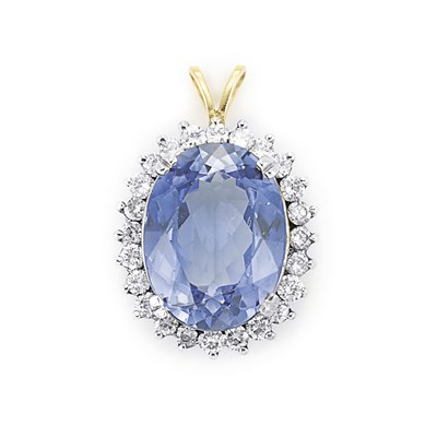 Lot 844 - White Gold, Tanzanite and Diamond Pendant