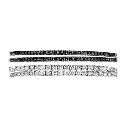 Lot 83 - Four White Gold, Diamond and Black Diamond Bangle Bracelets