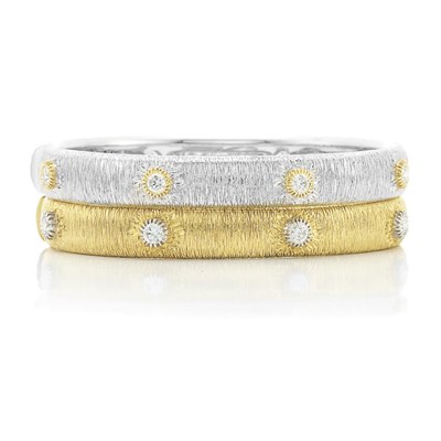 Lot 489 - Pair of White and Yellow Gold and Diamond Bangle Bracelets