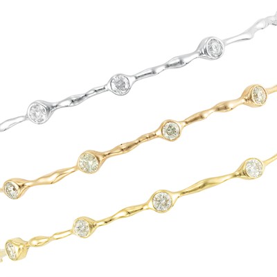 Lot 576 - Three Tricolor Gold and Diamond Bangle Bracelets