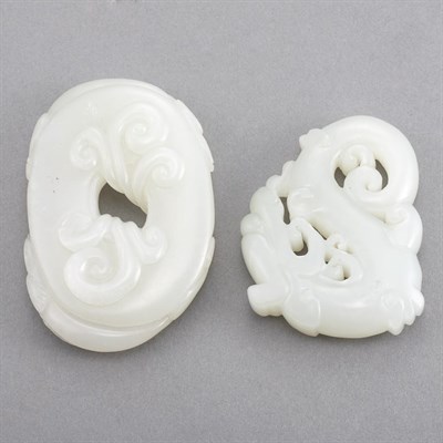 Lot 398 - Chinese White Jade Toggle Carved as a disk...