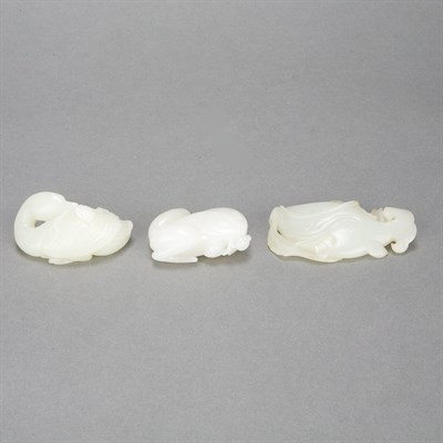 Lot 360 - Group of Three Jade Toggles 19th Century...