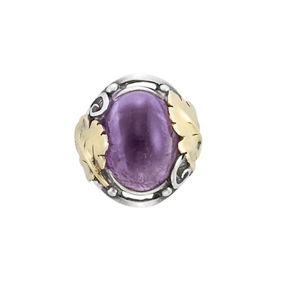 Lot 28 - Arts and Crafts Silver, Gold and Cabochon Amethyst Ring