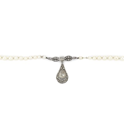 Lot 766 - Cultured Pearl, Silver and Foiled-Back Diamond Necklace