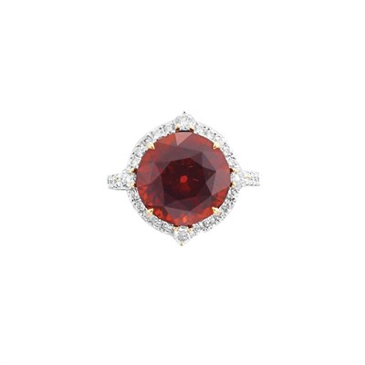 Lot 75 - Platinum, Gold, Garnet and Diamond Ring