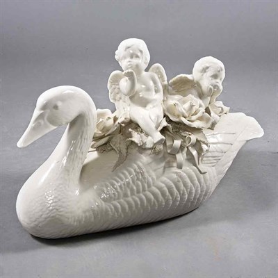 Lot 222 - White Glazed Porcelain Swan and Putto-Form...