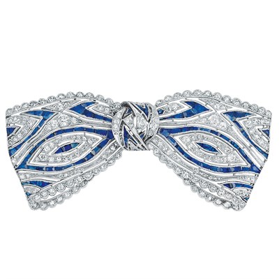 Lot 601 - Art Deco Platinum, Diamond and Sapphire Bow Brooch