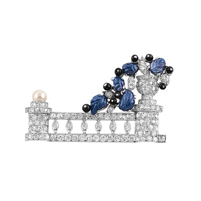 Lot 585 - Art Deco Platinum, Diamond, Carved Sapphire, Black Onyx and Pearl Brooch