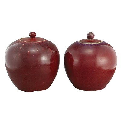 Lot 1418 - Two Chinese Sang de Boeuf Covered Jars Height...