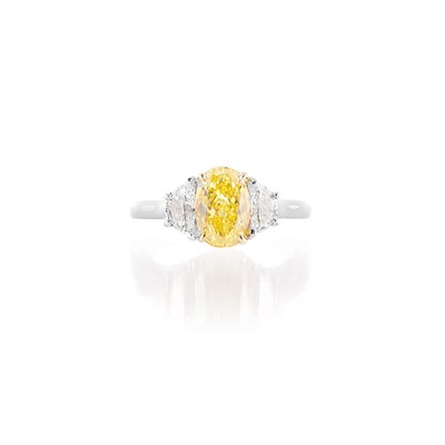 Lot 539 - Platinum, Gold, Fancy Intense Yellow Diamond and Diamond Ring