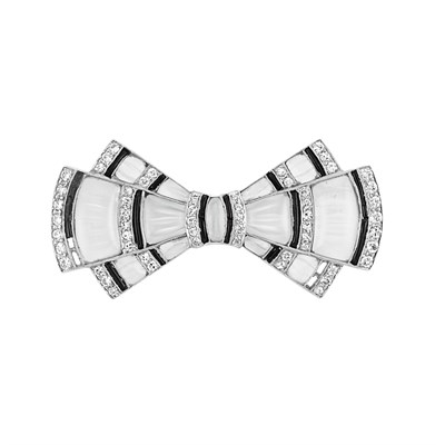 Lot 568 - Art Deco Platinum, Carved Rock Crystal, Black Onyx and Diamond Bow Pin
