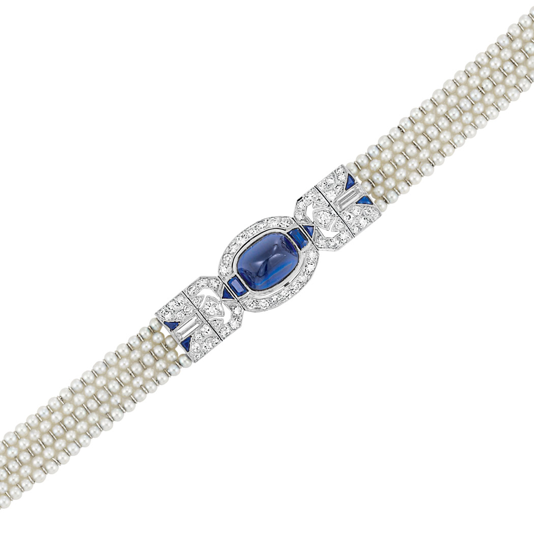 Lot 611 - Edwardian Platinum, Cabochon Sapphire, Sapphire, Diamond and Seed Pearl Mesh Bracelet