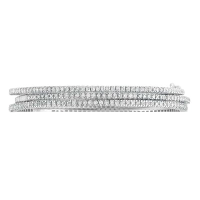 Lot 78 - Three White Gold and Diamond Bangle Bracelets