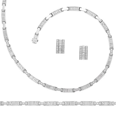 Lot 327 - White Gold and Diamond 'Atlas' Necklace, Bracelet and Pair of Hoop Earrings, Tiffany & Co.