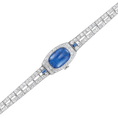 Lot 606 - Platinum, Cabochon Sapphire, Sapphire and Diamond Bracelet-Watch