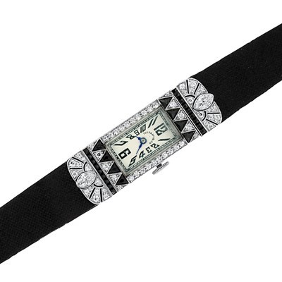 Lot 565 - Art Deco Platinum, Black Onyx and Diamond Wristwatch, Tiffany & Co.