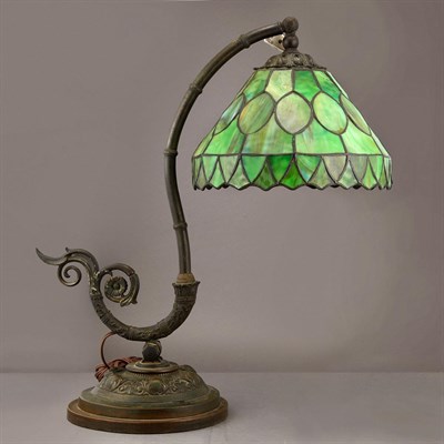 Lot 348 - Arts and Crafts Bronze and Leaded Glass Lamp...
