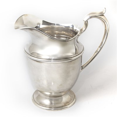 Lot 329 - Poole Sterling Silver Water Pitcher...