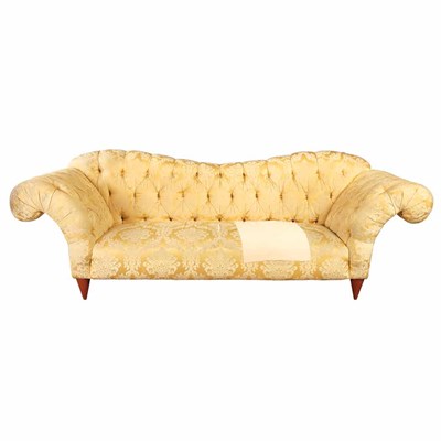 Lot 603 - Tufted Upholstered Sofa The reverse serpentine...