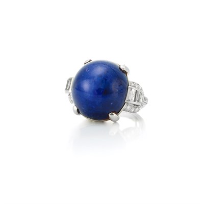 Lot 607 - Platinum, Cabochon Sapphire and Diamond Ring