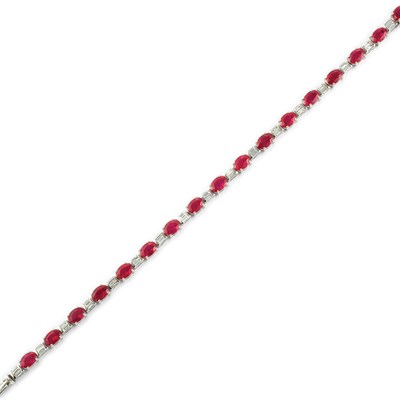 Lot 618 - White Gold, Ruby and Diamond Bracelet