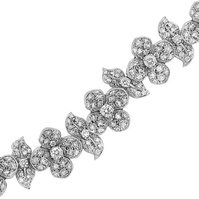 Lot 384 - White Gold and Diamond Floret Bracelet