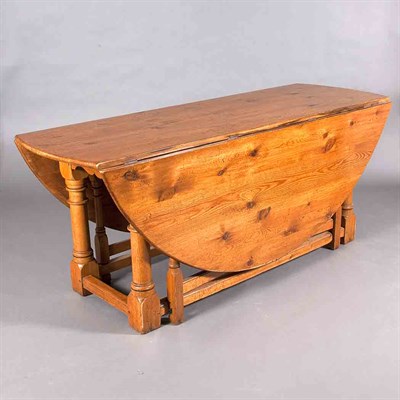 Lot 392 - Provincial English Fruitwood Gate Leg Dining...