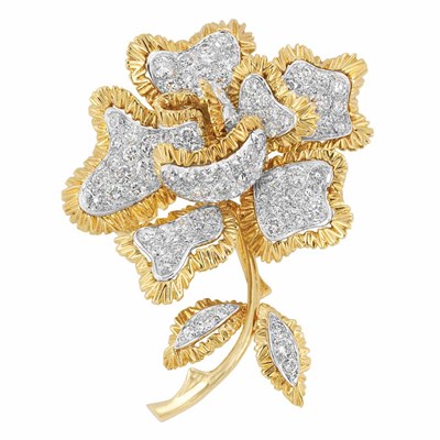 Lot 563 - Two-Color Gold and Diamond Flower Clip-Brooch