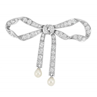 Lot 508 - Belle Epoque Platinum, Gold, Diamond and Pearl Bow Brooch, Tiffany & Co.