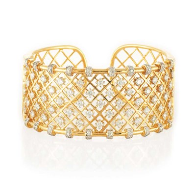 Lot 591 - Gold and Diamond Cuff Bangle Bracelet