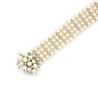Lot 643 - Four Strand Cultured Pearl, White Gold and Diamond Bracelet