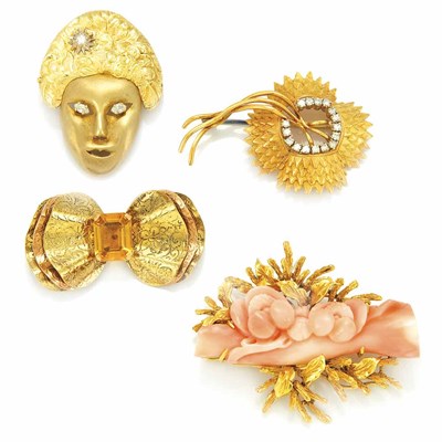 Lot 600 - Eight Gold, Diamond, Gem-Set and Carved Coral Brooches