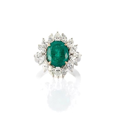 Lot 638 - Platinum, Emerald and Diamond Ring