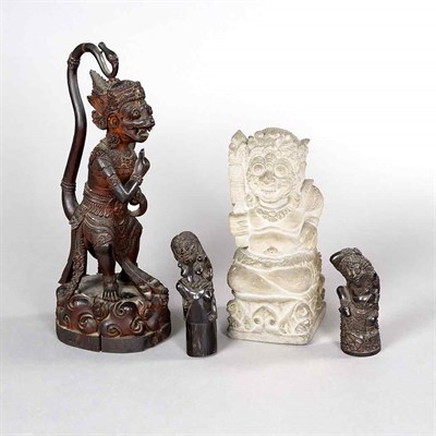Lot 257 - Group of Four Indonesian Carved Wood Tribal...