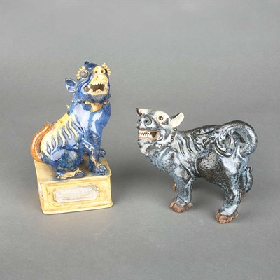 Lot 325 - Two Chineses Porcelain Figures of Foo Lions...