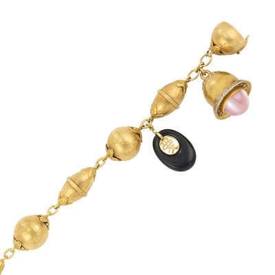 Lot 141 - Gold Bead Charm Bracelet