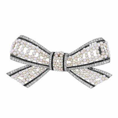 Lot 529 - Art Deco Platinum, Pearl and Black Onyx Bow Brooch