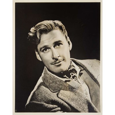 Lot 288 - FLYNN, ERROL Photograph inscribed. Vintage...